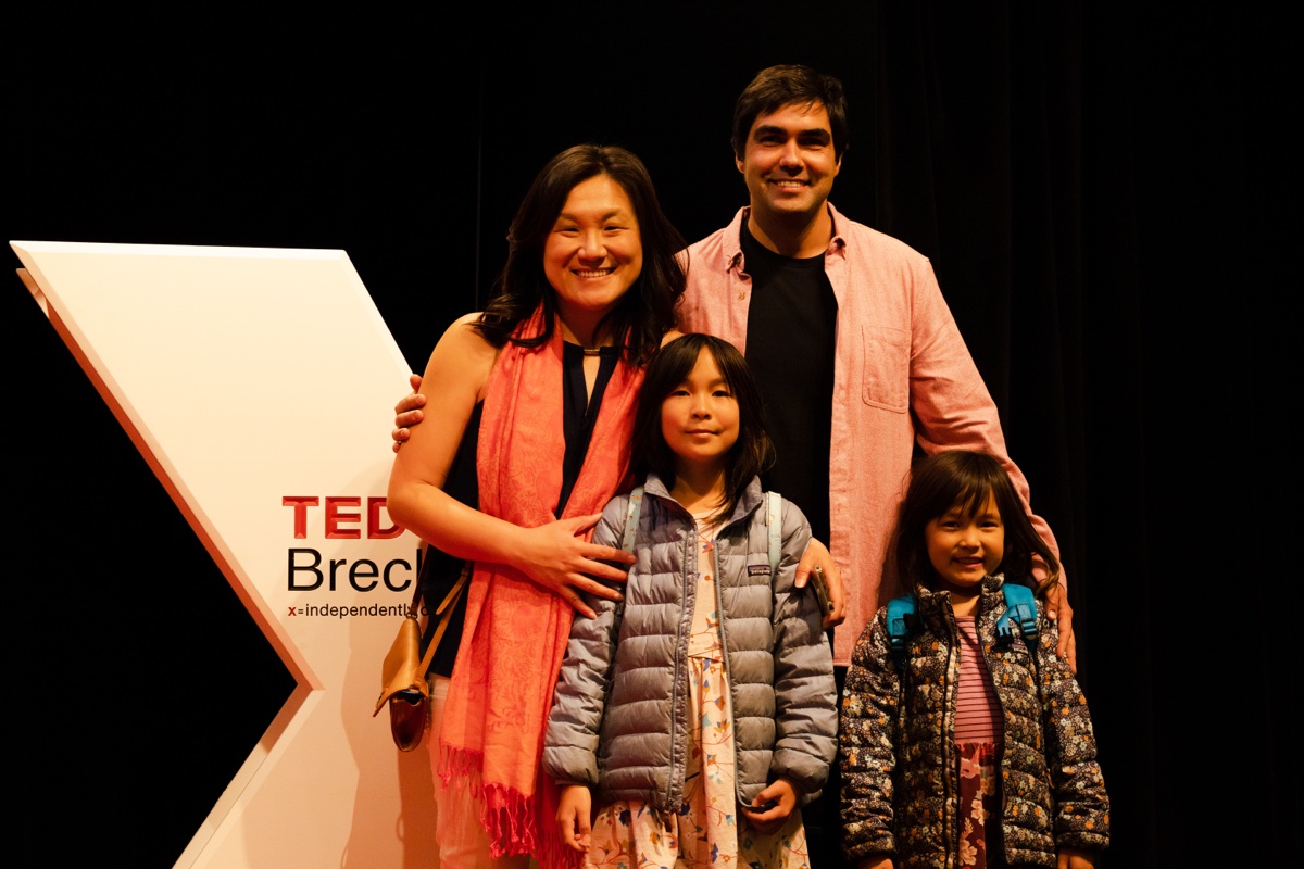 Family posing at TEDxBreckenridge event, showcasing our welcoming and family-friendly atmosphere