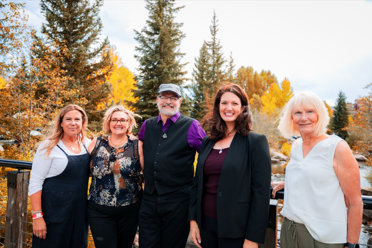 TEDxBreckenridge speakers posing together outdoors, representing our community of local voices